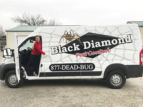 Carly Lynch, administrative operations manager at Black Diamond Evansville, shows off a new company vehicle.