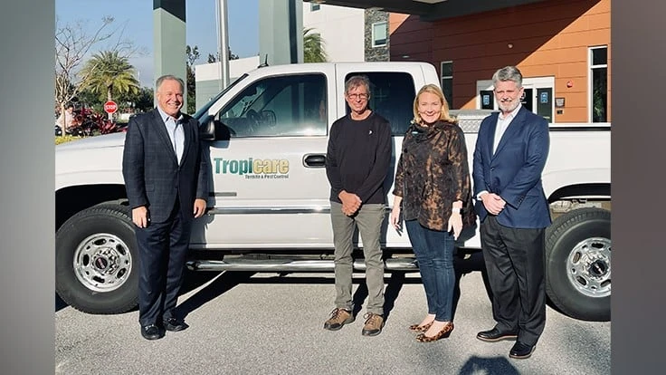 Atlanta-based Arrow Exterminators announced the merger and acquisition of Tropicare Termite and Pest Control, a service company focusing on providing residential pest and termite control and lawn care in the Tampa Bay area. Pictured left to right: Kevin Burns (Arrow), Marty Gagnon (Tropicare), Emily Thomas Kendrick (Arrow), and Tim Pollard (Arrow).