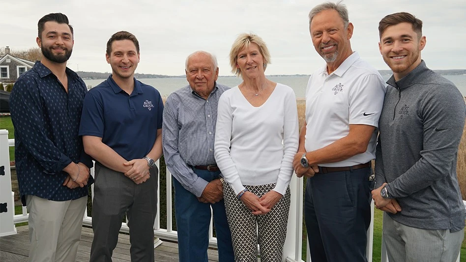 Pictured (left to right): Nick Aust, Dan Aust, Ernie Nascimento, Michele Eccles, Stuart Aust and Chris Aust.