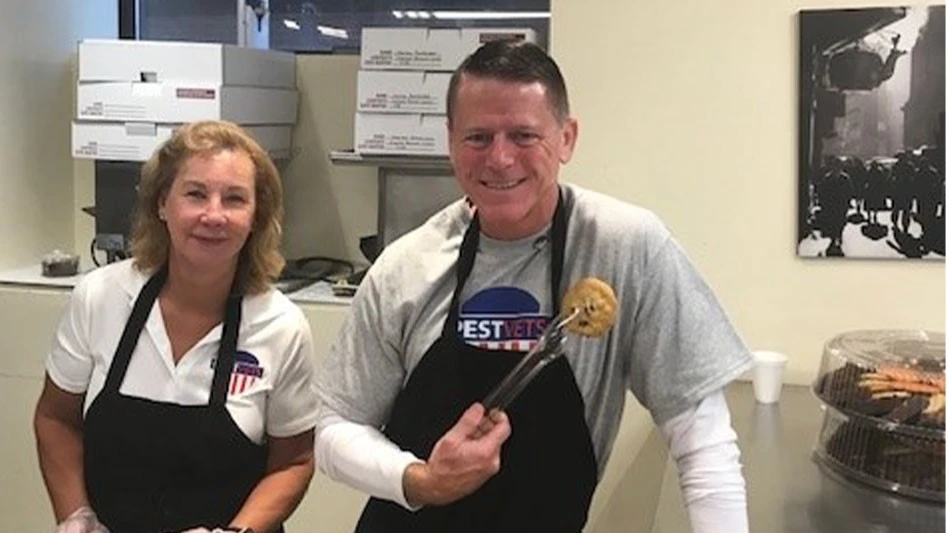 Marie Horner and Curtis Rand anning the chow line at NECHV and serving lunch to approximately 130 Veterans and staff.