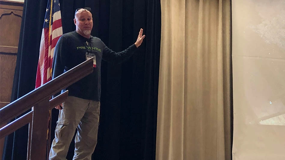 Alan Feuer speaking at this year's Purdue Pest Management conference.