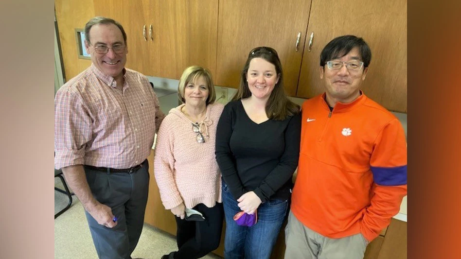 From left to right, Dr. Eric Benson; Jackie Ellis, school/training coordinator; Brittany Ellis, technician; and Jinbo Song, post-doc