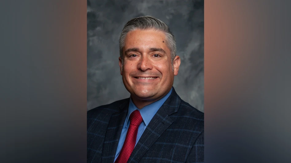 A headshot of Santos Portugal