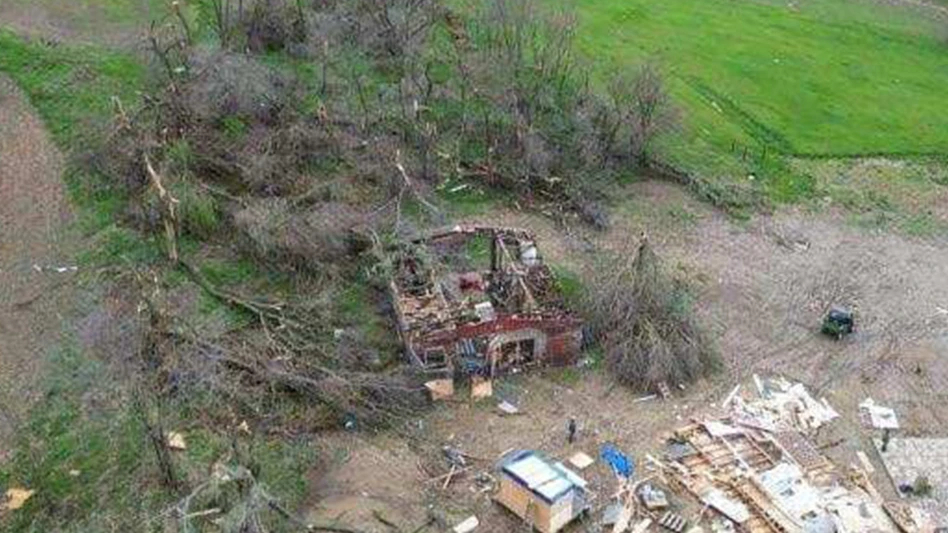 Aerial view of the remnants of the Warren's home that was destroyed by a tornado.